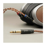 Close-up of Meze POET dual 3.5 mm jacks and braided copper cable