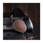 Meze POET open-back headphone profile showing grille and earcup geometry